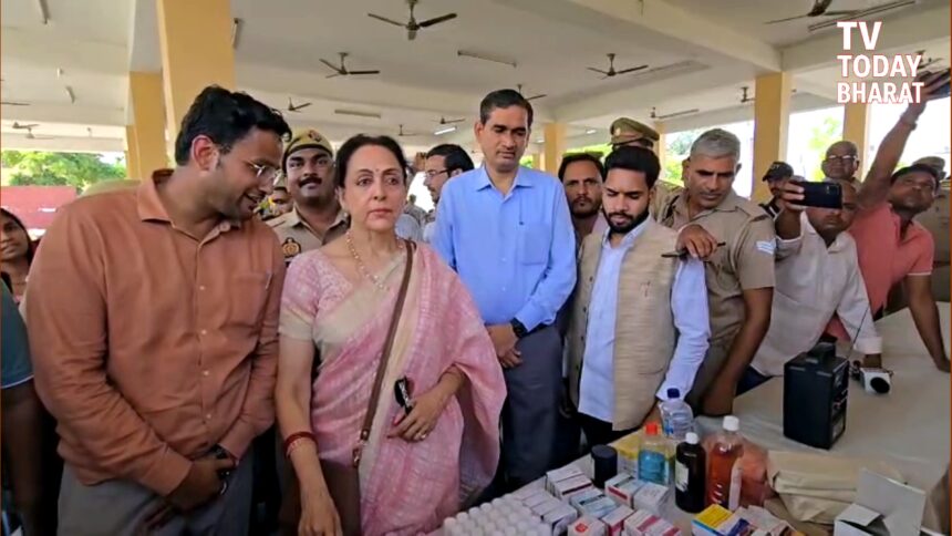 Hema Malini distributing food and meeting flood-affected people at relief camps in Mathura
