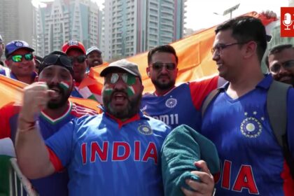 "Fans cheering at India vs Pakistan Asia Cup Final 2025 in Dubai stadium with colorful flags and banners."