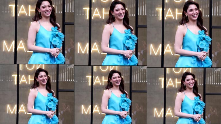 Tamannaah Bhatia in blue dress smiling and posing