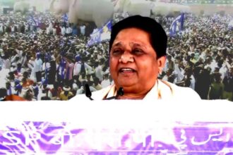 "Mayawati addressing a large rally in Mathura, warning about conspiracy to weaken BSP and emphasizing party unity and Dalit empowerment.