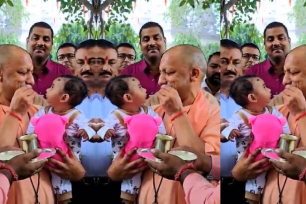 गोरखपुर में गोवर्धन पूजा के मौके पर मुख्यमंत्री योगी आदित्यनाथ बच्चे का अन्नप्राशन संस्कार करते हुए गोरखनाथ मंदिर में
