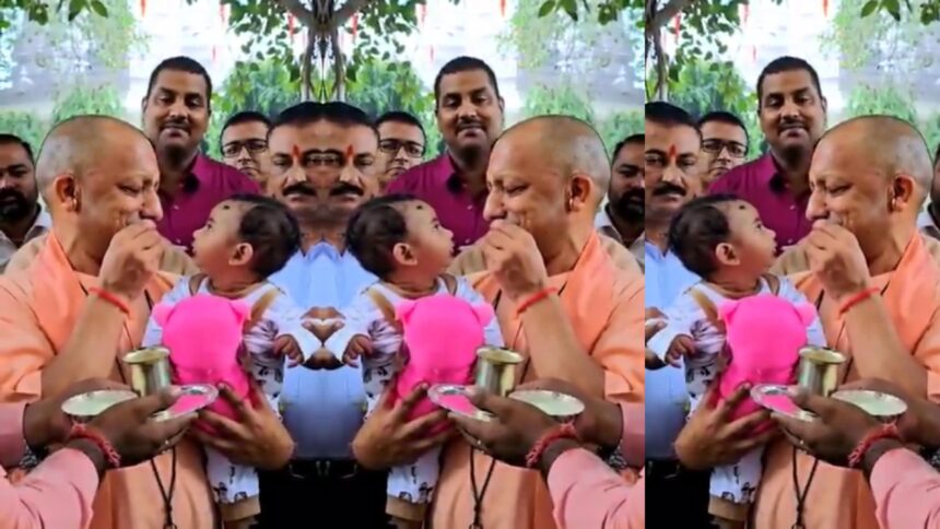 गोरखपुर में गोवर्धन पूजा के मौके पर मुख्यमंत्री योगी आदित्यनाथ बच्चे का अन्नप्राशन संस्कार करते हुए गोरखनाथ मंदिर में