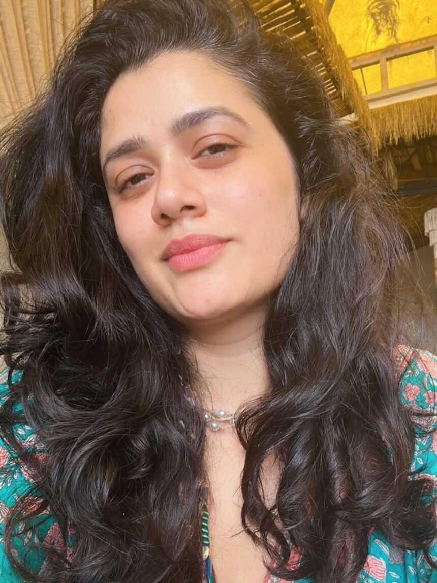 Girija Oak in blue saree during viral interview looking elegant and smiling