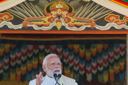 Prime Minister Narendra Modi delivering a speech in Bhutan on Delhi blast, vowing strict action against culprits; background visuals of Red Fort explosion site and security personnel inspecting the area.