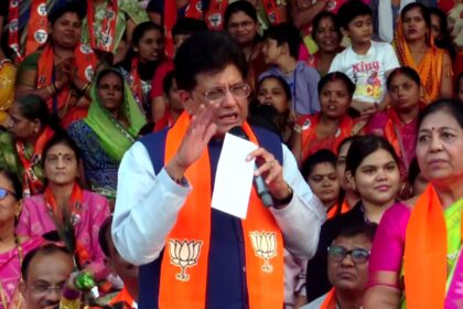 Piyush Goyal attending Birsa Munda Jayanti programme in Mumbai, addressing audience during Tribal Pride Day event