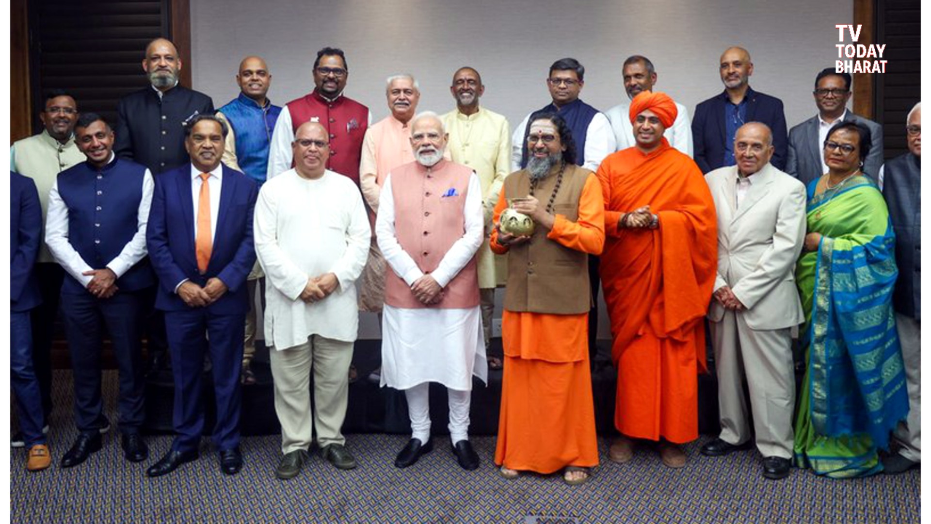 Prime Minister Narendra Modi interacting with Indian community leaders in Johannesburg during his South Africa visit for the G20 Summit.