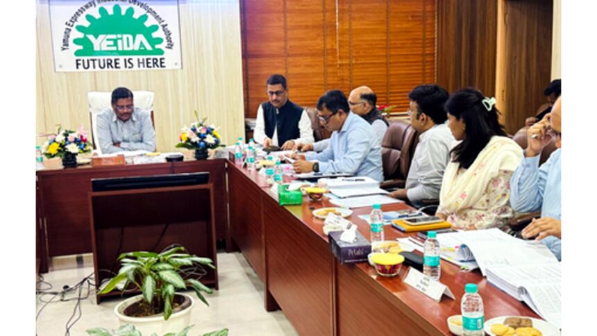 Officials during Yamuna Authority’s 87th Board Meeting discussing development projects, Jewar Airport connectivity, and housing plans in Greater Noida.