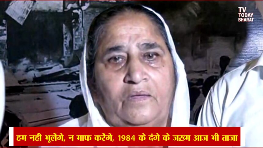 1984 Anti-Sikh Riots survivors protesting for justice in Delhi, holding placards that read “We Won’t Forget or Forgive” against Congress involvement