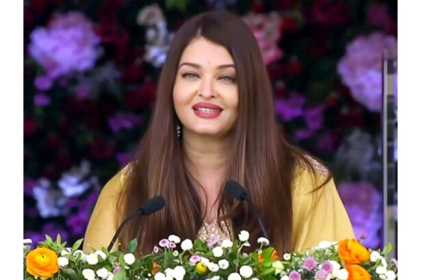 Aishwarya Rai Bachchan speaking at Sathya Sai Baba centenary celebrations, sharing Bal Vikas memories in a graceful traditional look.