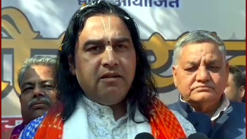 Acharya Devkinandan Thakur flags off VHP Shaurya Yatra in Mathura during a large cultural gathering.