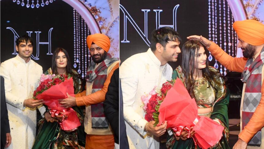 Haryana Chief Minister Nayab Singh Saini congratulating Olympic gold medallist Neeraj Chopra and tennis player Himani Mor at their wedding reception in Karnal, Haryana