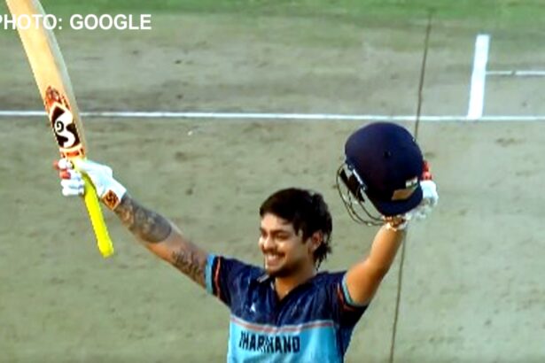 Jharkhand team celebrating maiden Syed Mushtaq Ali Trophy title after defeating Haryana, with captain Ishan Kishan lifting the trophy.