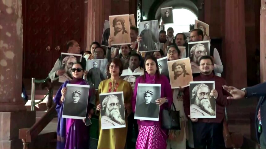 TMC MPs holding photos of Rabindranath Tagore and Bankim Chandra Chatterjee during Vande Mataram debate in Parliament
