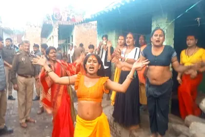 Transgender community members protest over an alleged property dispute at their late guru’s house in Fatehpur, Uttar Pradesh, as police intervene to control the situation.