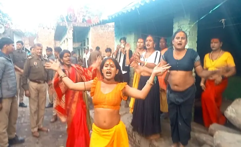 Transgender community members protest over an alleged property dispute at their late guru’s house in Fatehpur, Uttar Pradesh, as police intervene to control the situation.