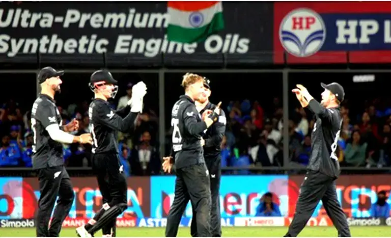 India vs New Zealand 3rd ODI match action showing Virat Kohli celebrating his century during the decisive ODI as New Zealand players react after sealing the series 2–1.