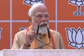 Prime Minister Narendra Modi addressing BJP workers at the party headquarters in New Delhi during the ceremony where Nitin Nabin took charge as BJP national president.