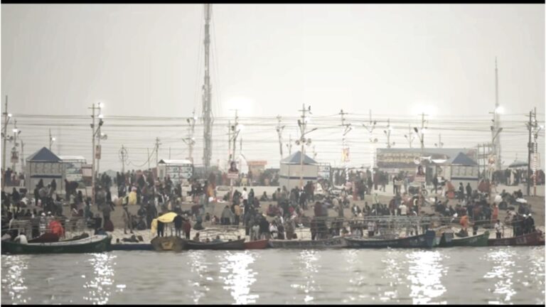 Devotees taking holy dip at Triveni Sangam during Magh Mela 2026 in Prayagraj