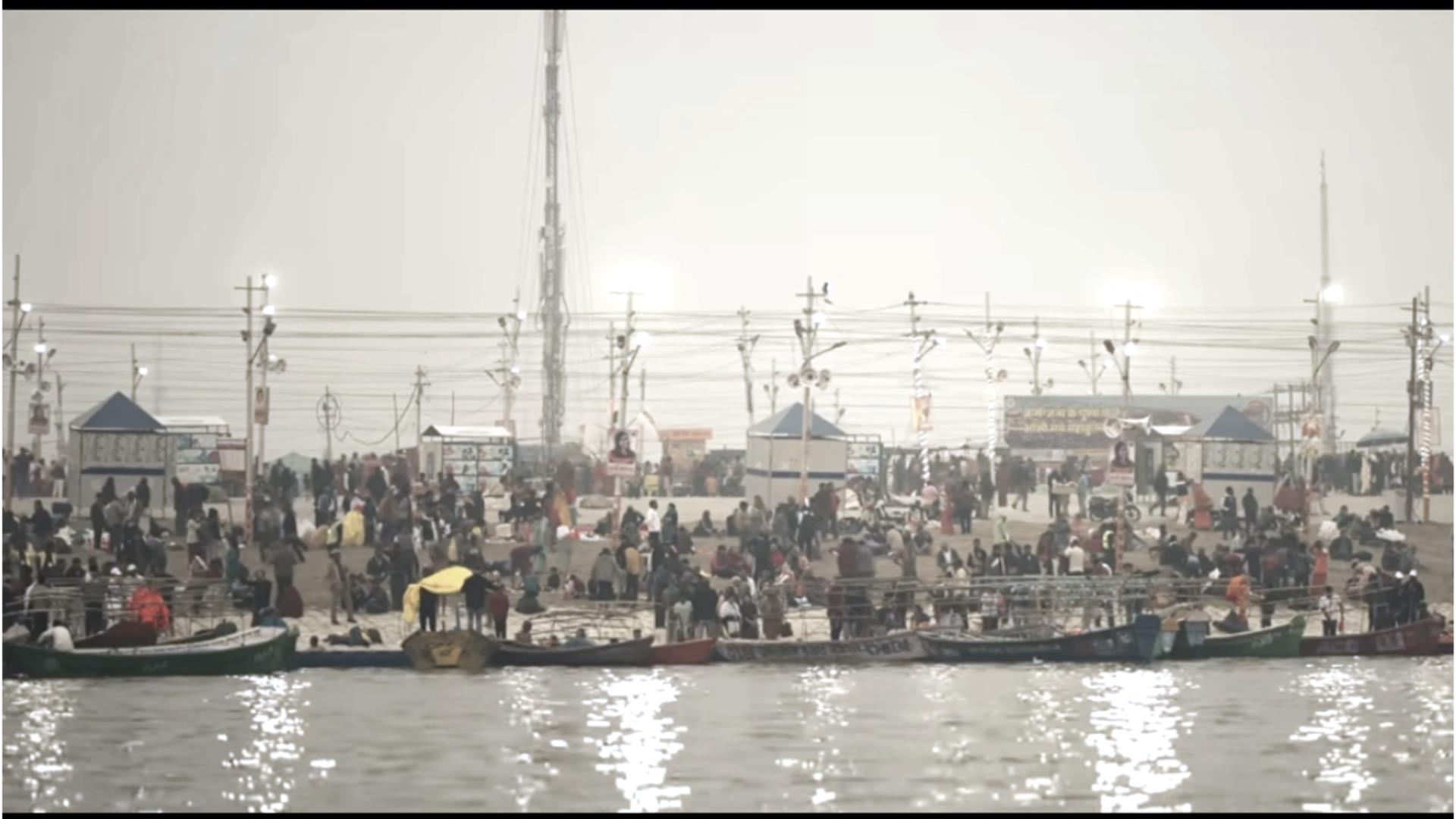 Devotees taking holy dip at Triveni Sangam during Magh Mela 2026 in Prayagraj