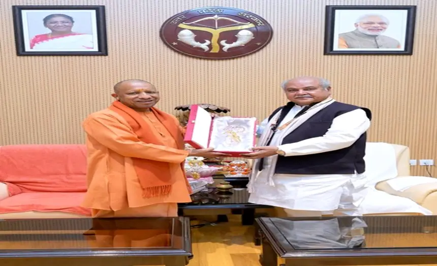 UP Chief Minister Yogi Adityanath meets Madhya Pradesh Assembly Speaker Narendra Singh Tomar at his official residence in Lucknow.