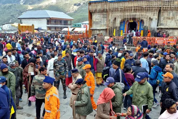 Devotees submitting mobile phones at temple cloakroom during Char Dham Yatra 2026 in Uttarakhand