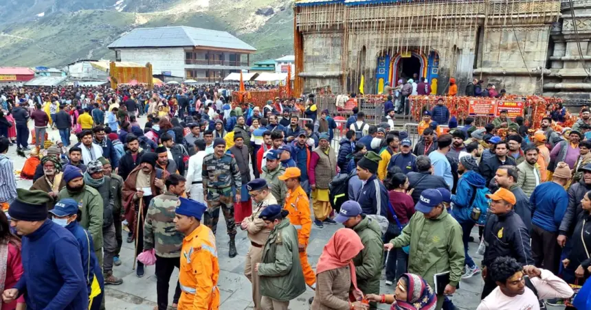 Devotees submitting mobile phones at temple cloakroom during Char Dham Yatra 2026 in Uttarakhand