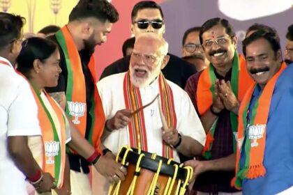Palakkad Kerala BJP Rally: BJP leader addressing large crowd at Palakkad Kerala rally with party flags and supporters