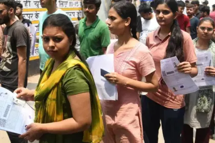CUET-UG 2026: Students waiting outside a CUET UG 2026 examination center after technical issues delayed the test.