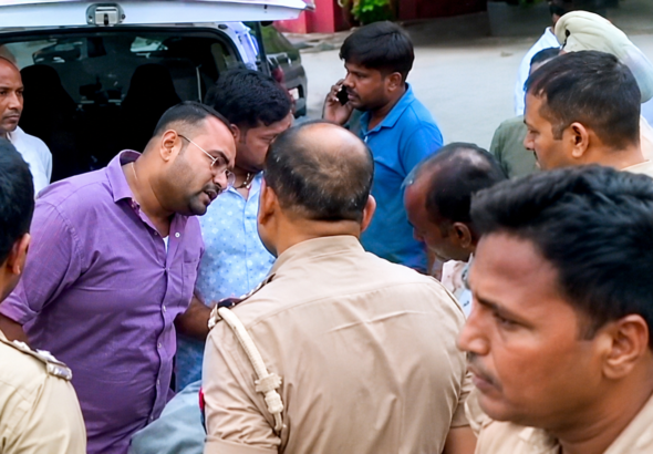 Baghpat Baraut Double Murder Case: scene where police investigate after a deadly firing incident allegedly involving history-sheeter Varun Luhari, resulting in the deaths of a tent trader and his son.