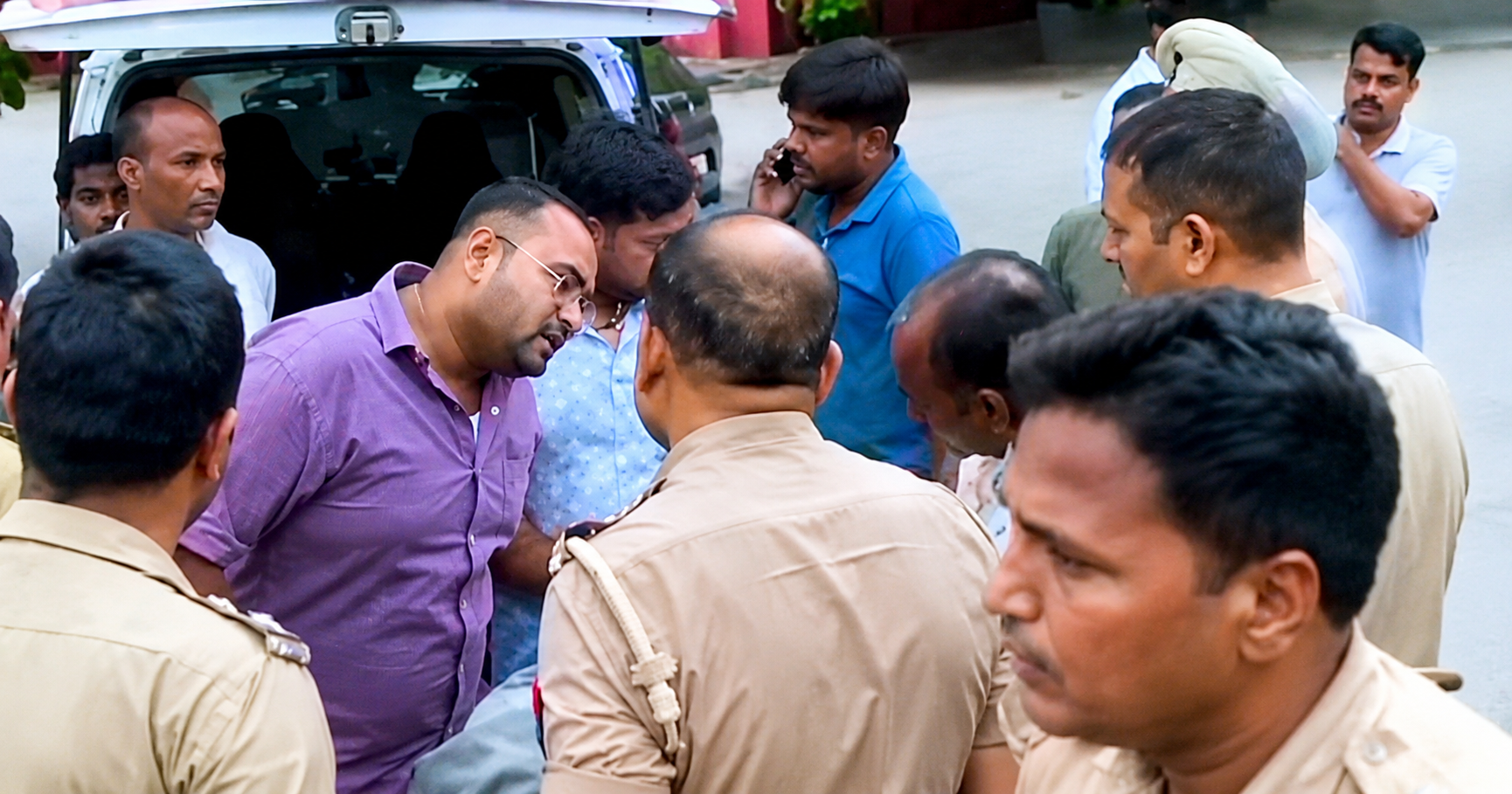 Baghpat Baraut Double Murder Case: scene where police investigate after a deadly firing incident allegedly involving history-sheeter Varun Luhari, resulting in the deaths of a tent trader and his son.