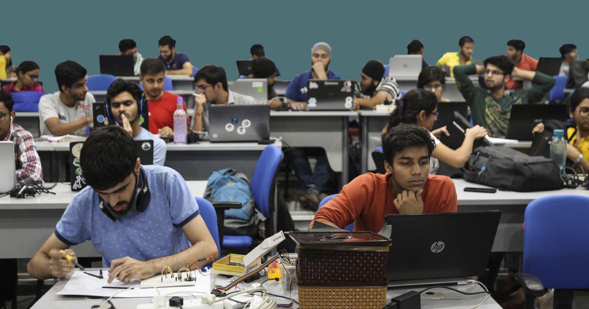 Education Industry Debate: Students attending an online learning session highlighting the growing industry around teacher branding, coaching culture