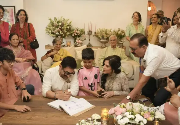 Aamir Khan marries Gauri Spratt: Aamir Khan signs marriage documents with Gauri Spratt during their intimate wedding ceremony in Mumbai surrounded by close family members