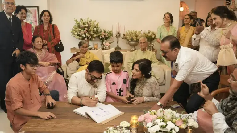 Aamir Khan marries Gauri Spratt: Aamir Khan signs marriage documents with Gauri Spratt during their intimate wedding ceremony in Mumbai surrounded by close family members