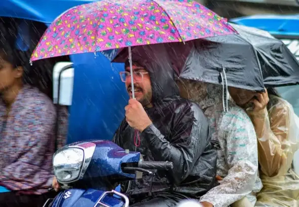 Heavy Rainfall Alert in India: Dark monsoon clouds and heavy rainfall over urban and rural regions of India as IMD issues Heavy Rainfall Alert in India for multiple states including Delhi, Uttar Pradesh, Maharashtra and Gujarat.