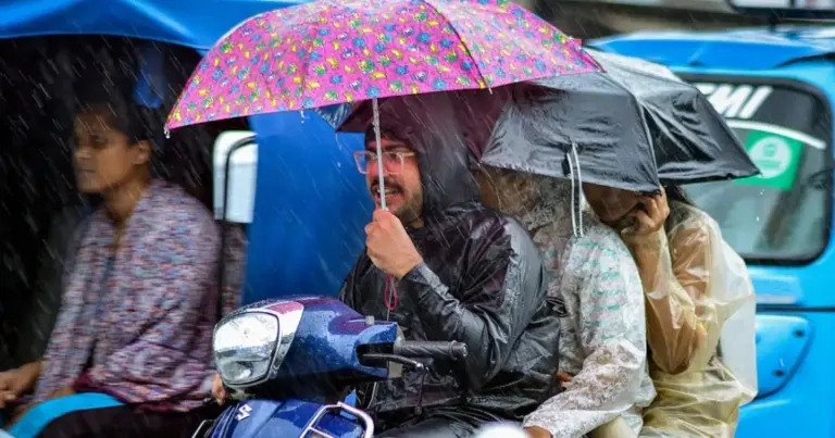 Heavy Rainfall Alert in India: Dark monsoon clouds and heavy rainfall over urban and rural regions of India as IMD issues Heavy Rainfall Alert in India for multiple states including Delhi, Uttar Pradesh, Maharashtra and Gujarat.