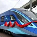 India Hydrogen Train: Prime Minister Narendra Modi flagging off India Hydrogen Train from Jind, Haryana, alongside a hydrogen-powered train and green energy theme.