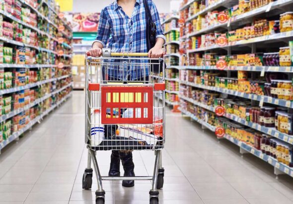 Customers shopping at a supermarket as the Government of India plans the Retail Consumption Survey to study consumer spending and retail buying patterns.