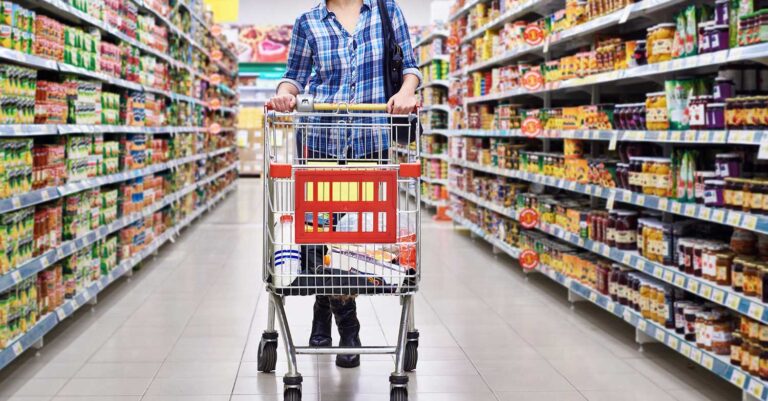 Customers shopping at a supermarket as the Government of India plans the Retail Consumption Survey to study consumer spending and retail buying patterns.