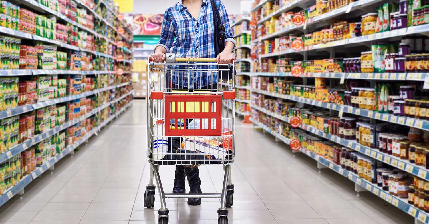 Customers shopping at a supermarket as the Government of India plans the Retail Consumption Survey to study consumer spending and retail buying patterns.