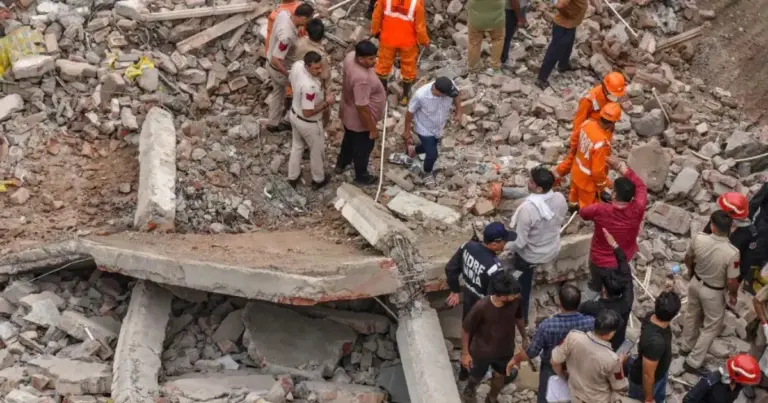 Rohini Building Collapse: Rescue teams clearing debris after the Rohini Building Collapse in Delhi, where an under-construction four-storey building collapsed, leaving multiple casualties and triggering a large-scale rescue operation.