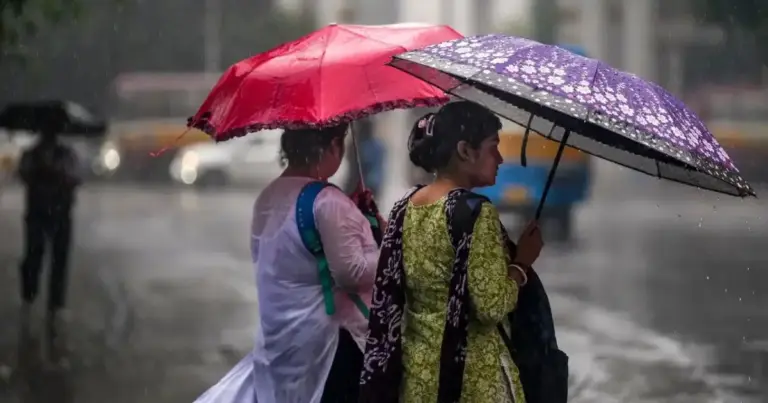 Weather Alert: Dark monsoon clouds over an Indian city with heavy rainfall, strong winds and lightning as weather authorities issue alerts across multiple states.
