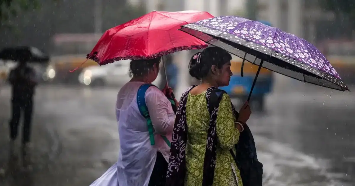 Weather Alert: Dark monsoon clouds over an Indian city with heavy rainfall, strong winds and lightning as weather authorities issue alerts across multiple states.