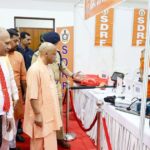 Uttar Pradesh Chief Minister inaugurating the new UPSDMA headquarters in Lucknow and honoring SDRF, PAC, and Fire Service personnel.