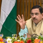 Prahlad Joshi addressing the media after receiving additional charge of the Education Ministry following Dharmendra Pradhan's resignation.