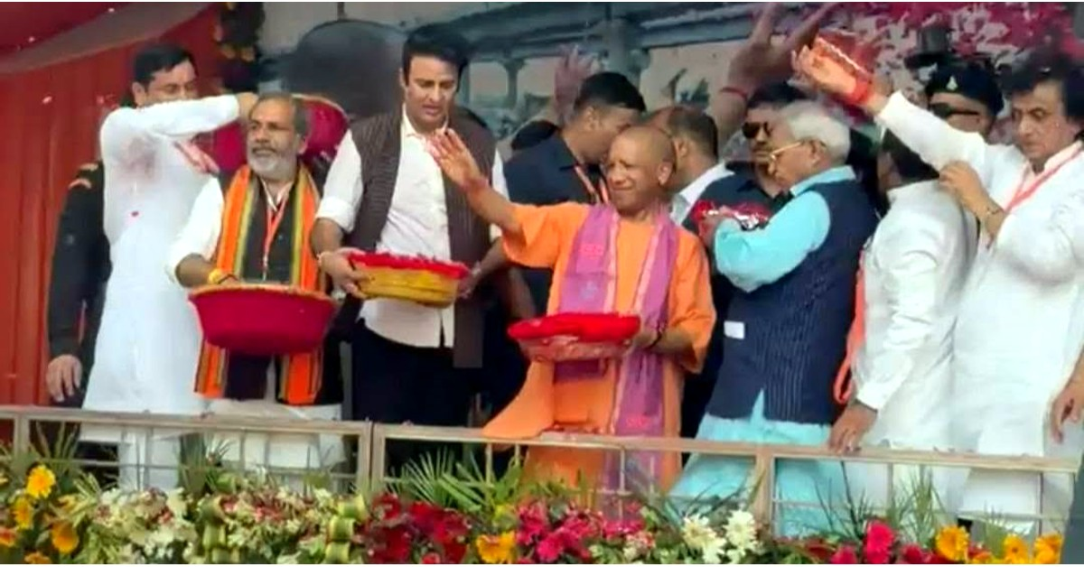 Yogi Meerut Kanwar Yatra: CM Yogi Adityanath showering flower petals on Kanwariyas at NH-58 in Meerut during Kanwar Yatra 2026