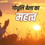 Woman lighting a diya during Godhuli Bela in the evening