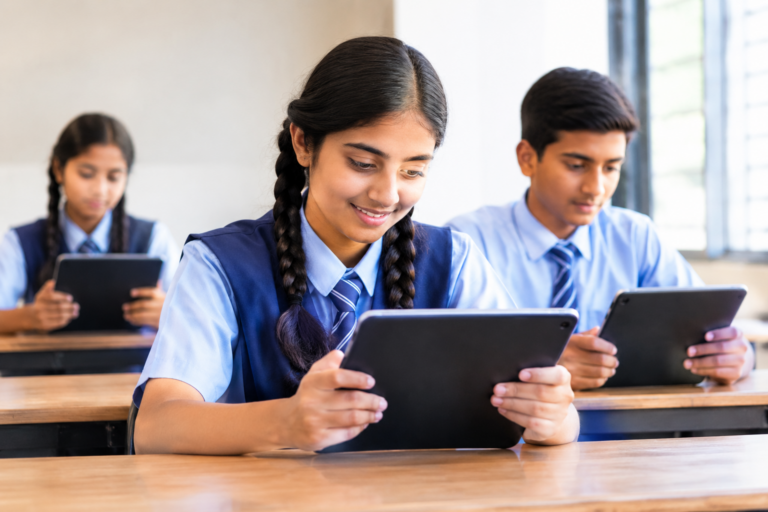 Haryana government school students using tablets for digital education under the Haryana School Tablets initiative